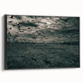Black and white framed canvas of a Latvian landscape, ideal for bedroom wall decor.