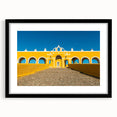 Abstract art print depicting vibrant, colorful scenery of Yucatan with textured details on a large framed canvas.