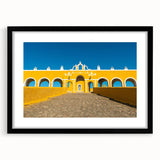 Abstract art print depicting vibrant, colorful scenery of Yucatan with textured details on a large framed canvas.