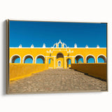 Framed canvas wall art depicting a vintage-style landscape of Yucatán, Mexico in gold and black tones.
