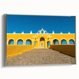 Framed canvas of a Yucatan landscape painting in vibrant colors with a vintage poster style.