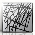 Framed minimalist black acrylic artwork, showcasing abstract geometric shapes, perfect for modern home decor. Ideal for enhancing contemporary spaces with style.