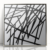 Framed minimalist abstract artwork in silver acrylic, showcasing geometric patterns and a sleek design, perfect for modern home decor and stylish interiors.