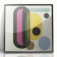 Abstract geometric acrylic wall art framed in black, showcasing vibrant colors and intricate shapes, perfect for modern home decor or office settings.