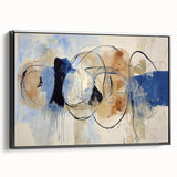 Framed canvas art displaying a modern abstract design with vibrant splatters in black and multicolor hues, showcasing a contemporary aesthetic perfect for any room.