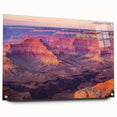 Acrylic glass wall art showcasing a vibrant landscape of canyons, featuring rich colors and intricate details, displayed with stylish pins for modern decor.