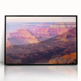 Framed acrylic artwork depicting a stunning landscape of canyons, showcasing rich earthy tones and dramatic rock formations, perfect for home decor.