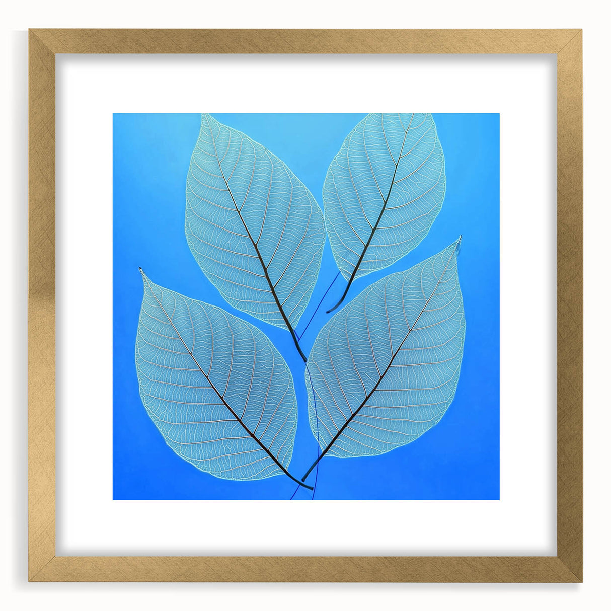 Extra large abstract art print featuring close-up textured leaves in green and gold hues, framed in gold.