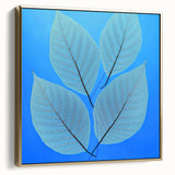 Framed canvas depicting close-up of leaves in silver and gold tones, suitable for bedroom wall art.
