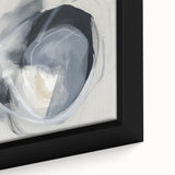 Close-up view of a minimalist framed canvas art piece showcasing abstract geometric shapes in muted tones of blue and beige, ideal for modern home decor.