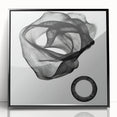 Abstract geometric framed acrylic artwork in black, showcasing sharp angles and modern design elements, perfect for contemporary home decor. Ideal for adding a stylish touch to any living space.
