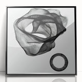 Abstract geometric framed acrylic artwork in black, showcasing sharp angles and modern design elements, perfect for contemporary home decor. Ideal for adding a stylish touch to any living space.