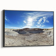 Framed canvas artwork showcasing a stunning landscape of canyons in warm earthy tones, featuring a sleek black frame that enhances its modern aesthetic. Perfect for home decor.