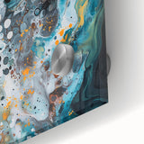 Close-up of an abstract acrylic glass artwork showcasing vibrant splatters of blue, orange, and yellow, emphasizing vivid colors and unique textures. Perfect for modern decor.