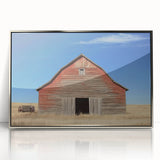 Framed acrylic wall art depicting a serene landscape scene with a barn, set against a vibrant sky. The artistic design features rich colors, ideal for home decor.