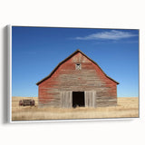 Landscape barn-framed canvas showcasing a serene countryside scene with lush greenery and a clear blue sky, ideal for rustic home decor and art enthusiasts.