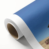 Rolled canvas showcasing a vibrant landscape barn design with rich colors and intricate details, securely packaged in a durable cardboard tube for safe shipping.