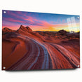 Acrylic glass side view of a desert landscape design showcasing vibrant colors and intricate details, secured with decorative pins for display.