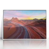 Framed acrylic landscape artwork depicting a serene desert scene in warm tones, featuring subtle textures and a sleek white frame, perfect for home decor.