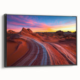 Framed canvas art showcasing a stunning desert landscape with vibrant orange and yellow hues. The black frame adds elegance, perfect for home decor.
