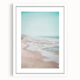Abstract art print featuring swirling blue and green patterns on a white framed canvas.