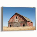 Landscape barn-themed canvas artwork displayed in a silver frame, showcasing vibrant colors and rustic charm; perfect for enhancing home decor settings.