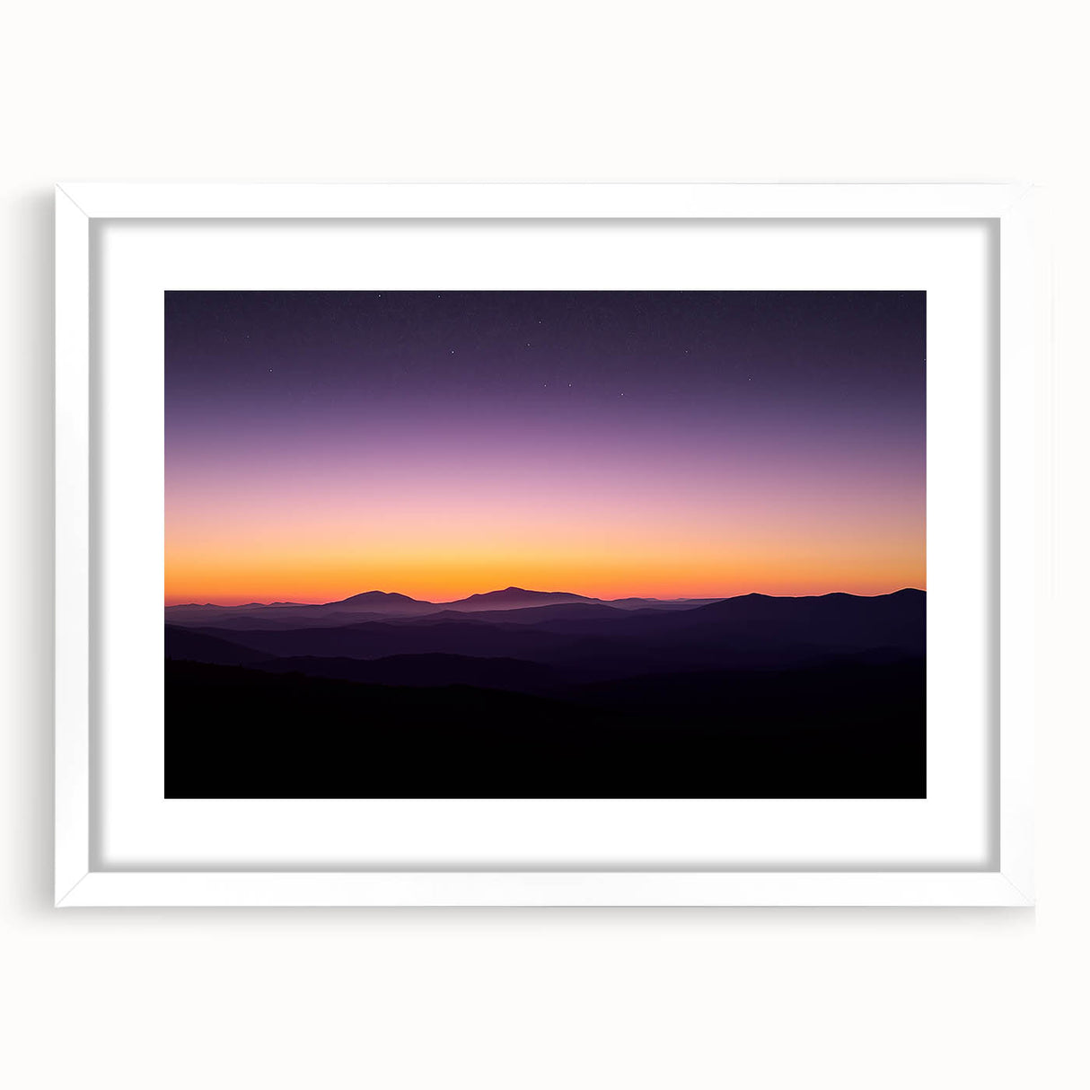 Desert landscape framed artwork with a white mat, showcasing vibrant colors and intricate details, perfect for home decor in a modern setting.