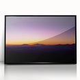 Framed acrylic artwork showcasing a vibrant desert landscape with striking colors, displayed from a front view against a minimalist black frame, ideal for modern decor.