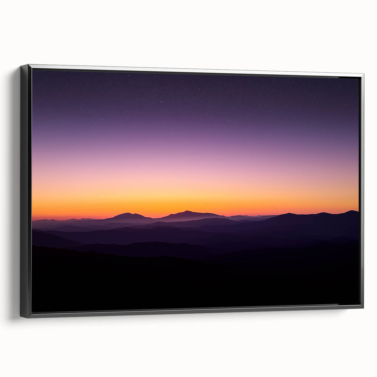 Framed canvas artwork showcasing a stunning desert landscape in warm tones, featuring a black frame that enhances the visual depth and elegance, ideal for home decor.
