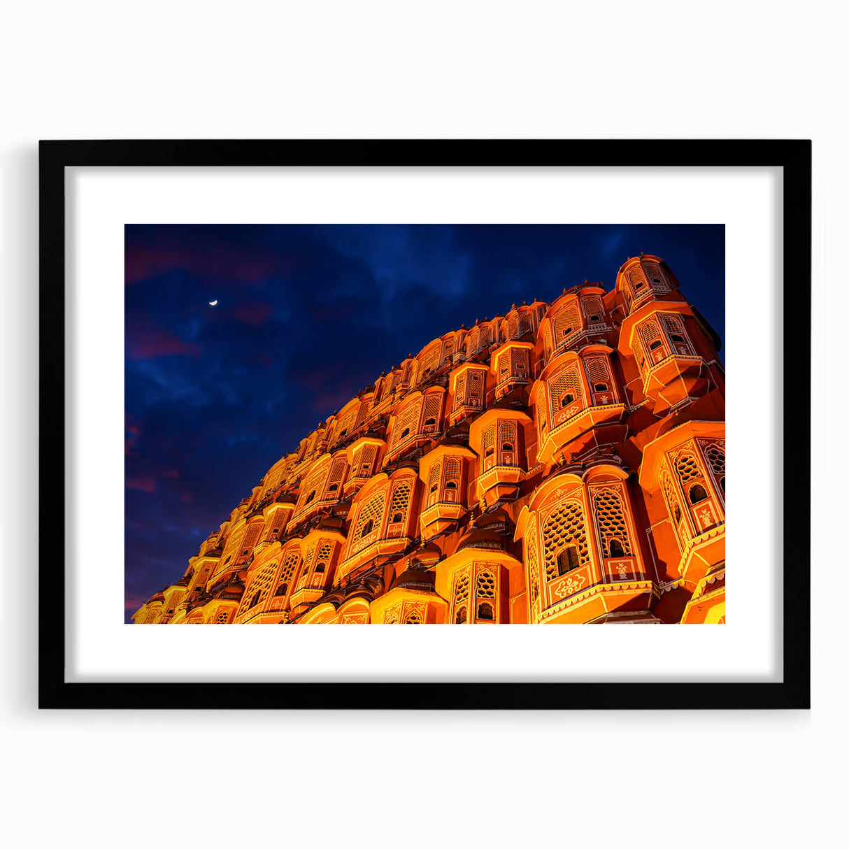 Colorful abstract art print depicting a textured Indian scenery in a black frame, ideal for living room decor.