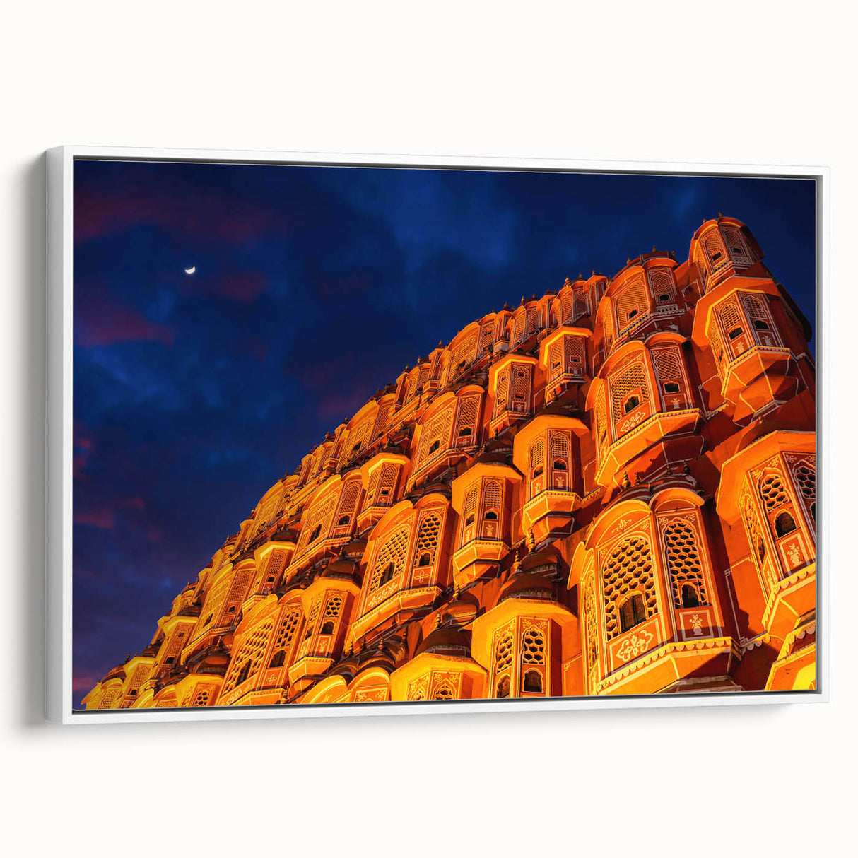 Landscape art painting of a serene Indian scenery on a framed canvas, featuring vibrant green and blue tones.