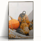 Mid-century modernist art depicting autumn trees in orange and red hues, silver-framed acrylic print.