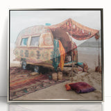 Mid-century modernist art featuring a caravan of vehicles in muted earth tones on a silver-framed acrylic print.