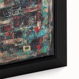 Close-up of a framed canvas artwork featuring vibrant abstract splatter designs in shades of blue, yellow, and red, enhancing modern decor aesthetics.