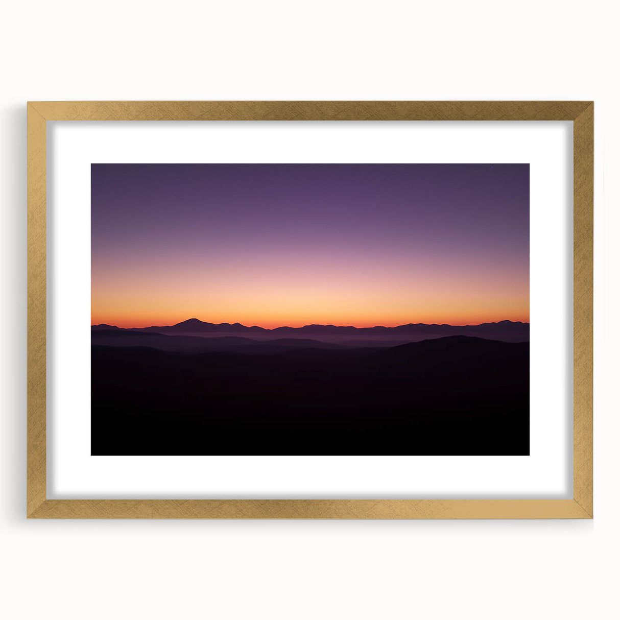 Desert landscape framed artwork with a gold mat, showcasing vibrant colors and intricate details, perfect for adding elegance to home decor.
