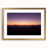 Desert landscape framed artwork with a gold mat, showcasing vibrant colors and intricate details, perfect for adding elegance to home decor.