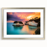 Framed landscape artwork showcasing dramatic cliffs in a serene setting, elegantly matted with a silver frame, ideal for enhancing modern home decor aesthetics.