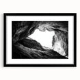 Framed landscape print showcasing a stunning canyon view, featuring a sleek black mat and frame, ideal for enhancing modern home decor. Perfect for nature lovers.