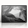 Framed acrylic artwork showcasing a stunning landscape of canyons in vibrant colors, featuring a sleek black frame, perfect for enhancing modern home decor.