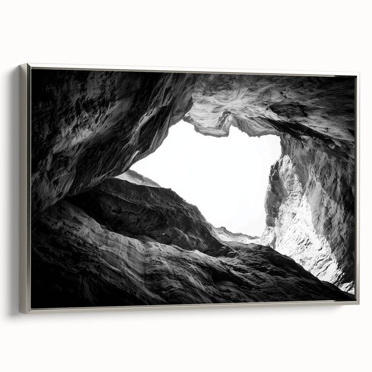 Framed landscape canvas artwork depicting majestic canyons with vibrant colors and intricate details, set in a stylish silver frame, perfect for home decor enhancement.