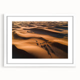Framed landscape artwork showcasing serene sand dunes with a white mat, perfect for home decor, enhancing any room's aesthetic with a touch of nature.