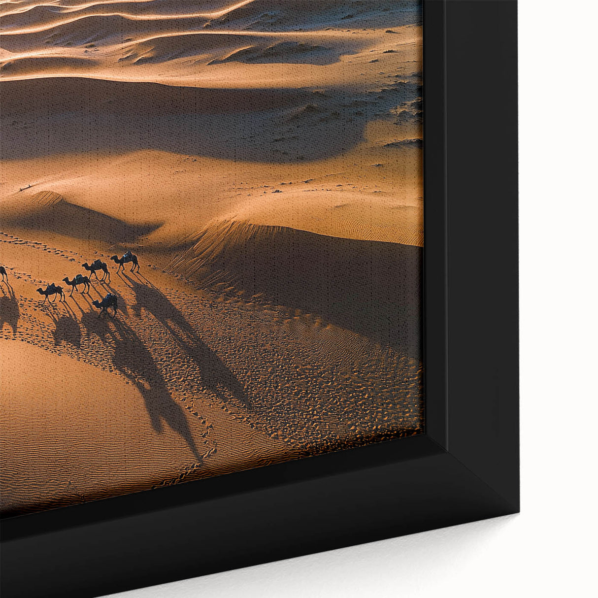 Close-up of a framed canvas depicting serene desert dunes at sunset, showcasing warm golden and orange hues that evoke tranquility and natural beauty. Ideal for home decor.