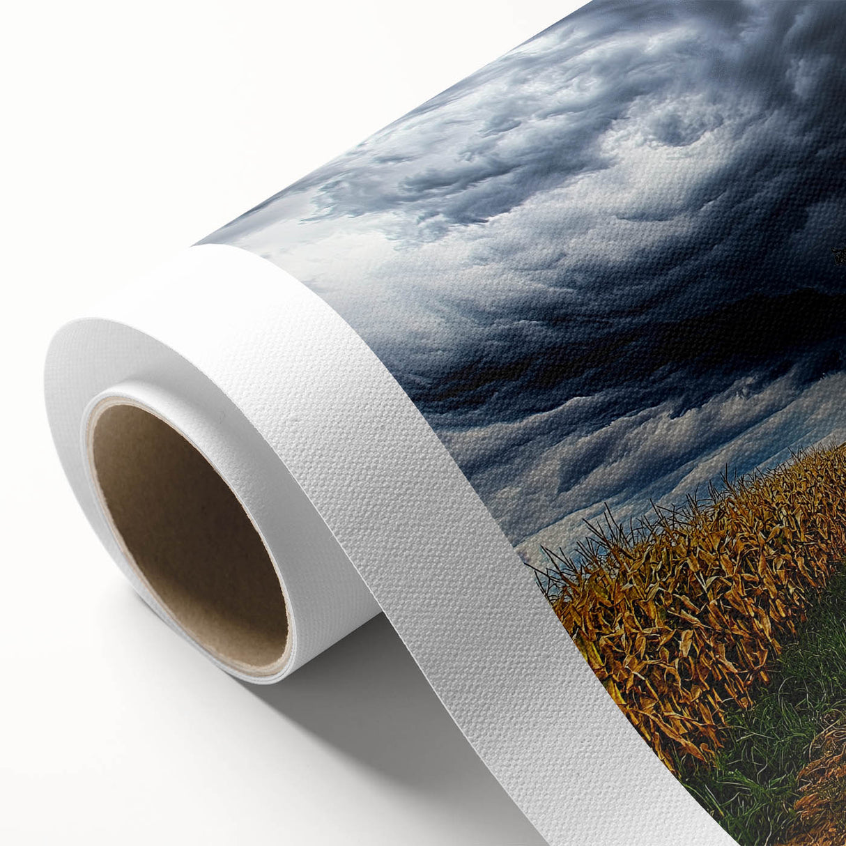 Vibrant rolled canvas depicting a serene landscape with lush green fields and a clear blue sky, designed for home decor in a protective cardboard tube.