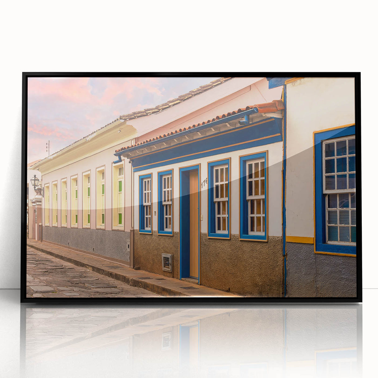 Large abstract wall art depicting a vibrant, colorful Brazilian landscape on a black framed acrylic print.