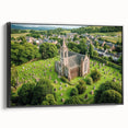 Framed canvas artwork showcasing a majestic landscape with a castle, displayed from the side against a black frame, ideal for enhancing home decor with a touch of elegance.