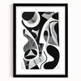 Abstract geometric frame in matte black, showcasing a unique design with sharp angles and modern aesthetics, ideal for contemporary home decor.