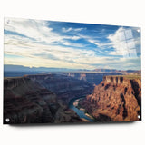 Acrylic glass artwork depicting a stunning landscape of canyons, showcasing rich earth tones and intricate textures, displayed with visible pins for mounting.