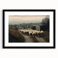 Black-framed landscape artwork featuring a serene countryside view with lush greenery and rolling hills, elegantly matted for a polished presentation.