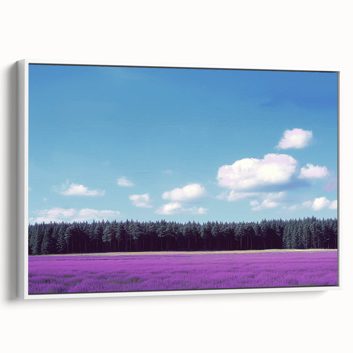 Framed canvas artwork showcasing a serene landscape with lush green fields and a bright blue sky, presented in a stylish white frame, perfect for home decor.