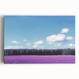 Vibrant stretched canvas showcasing a lush landscape with rolling green fields and a clear blue sky, ideal for home decor and nature-themed interiors.